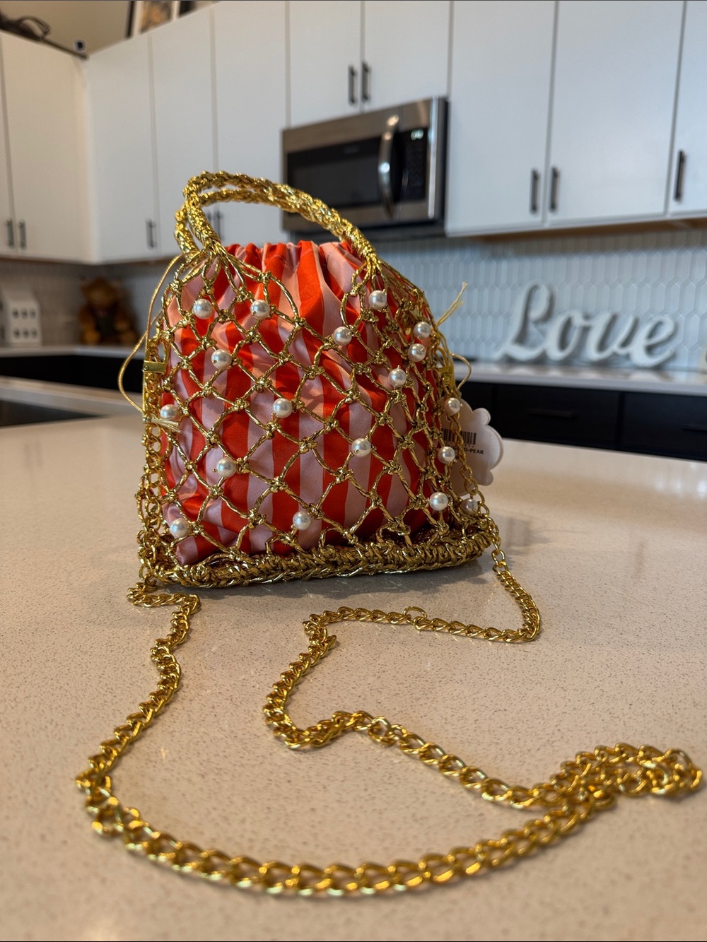 Gorgeous gold red and pink formal statement handbag from Paros Greece May 2026